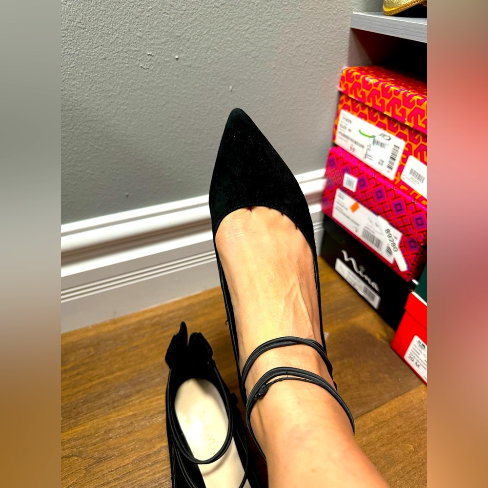 Black size 9 low heel pump with a back zip- Nine West